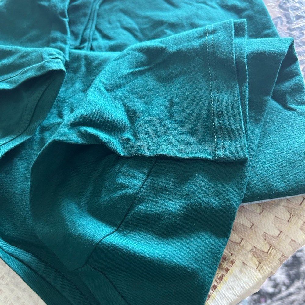 Brand new, never tried on and still in plastic tshirts
